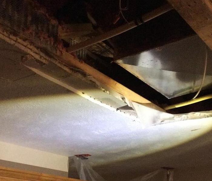 Ceiling gutted to assess water damage and source