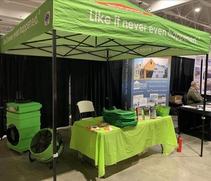 SERVPRO Logos and memorabilia displayed for a trade show